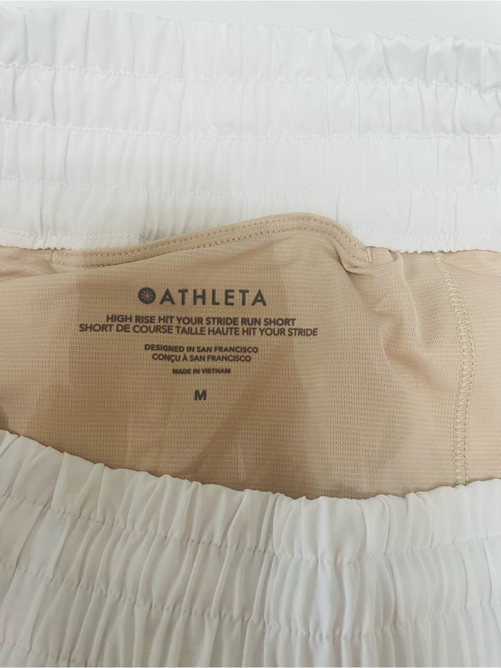 Athleta High Rise Hit Your Stride Run Shorts White Lined Women’s Size M NWT - Picture 4 of 7